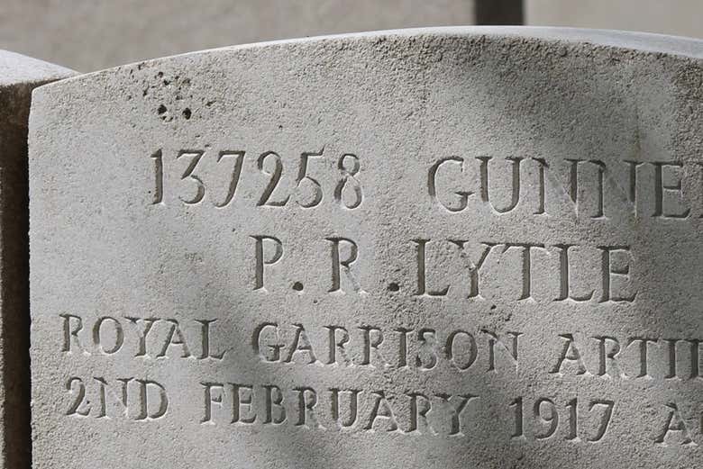 A close-up of a tomb stone